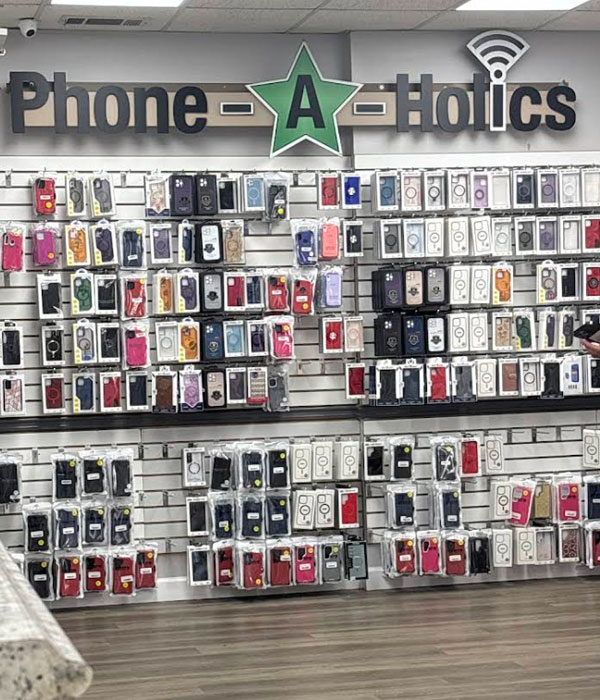 Phone-A-Holics interior — accessories wall